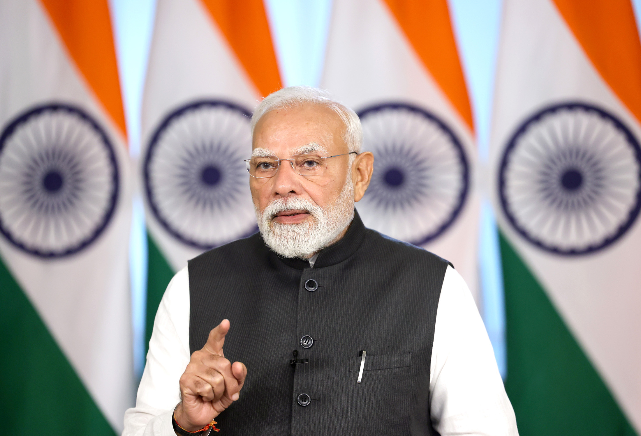 PM Narendra Modi allocates 1,449 PMAY Urban Houses and 130 shops in Gujarat.